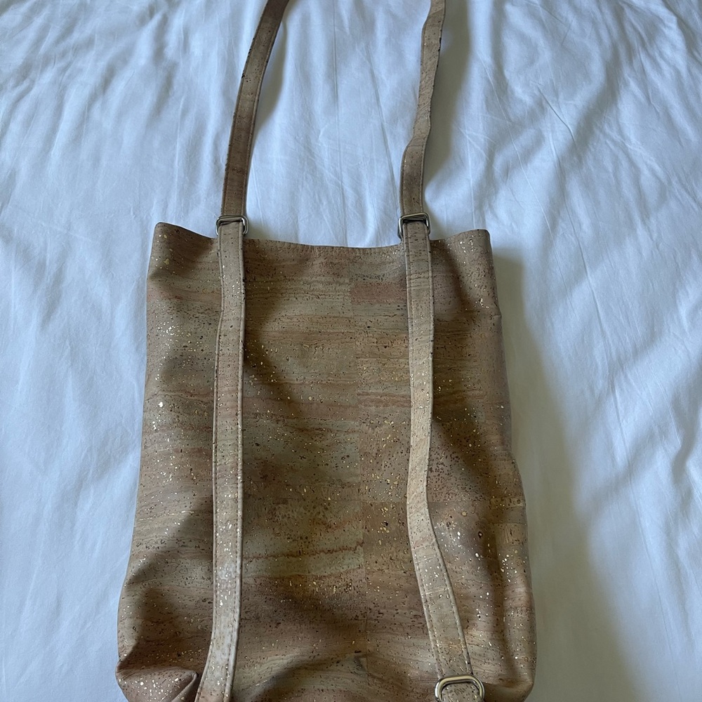 Cork purse that can be worn as a backpack or shoulder bag.